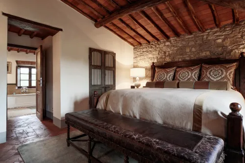 1669tuscanfarmhouseestate-18-rustic-bedroom
